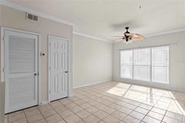 a view of an empty room and window