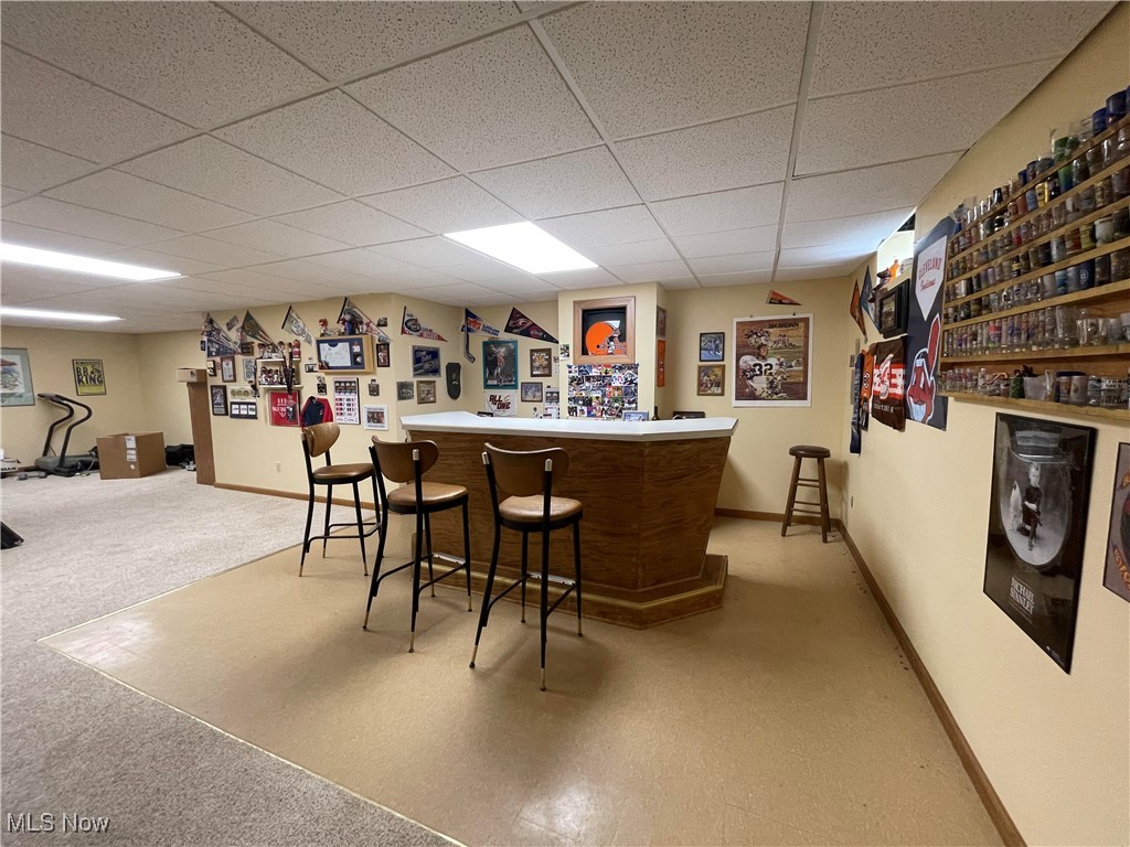 11662 Dunham Road Northfield, OH 44067 - Photo 36 of 50 Wetbar in basement sporting the "shrine" before the move