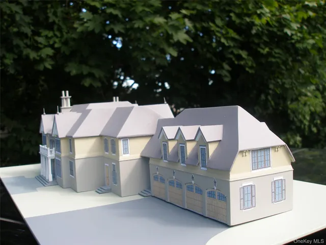 a view of multiple houses with a city street