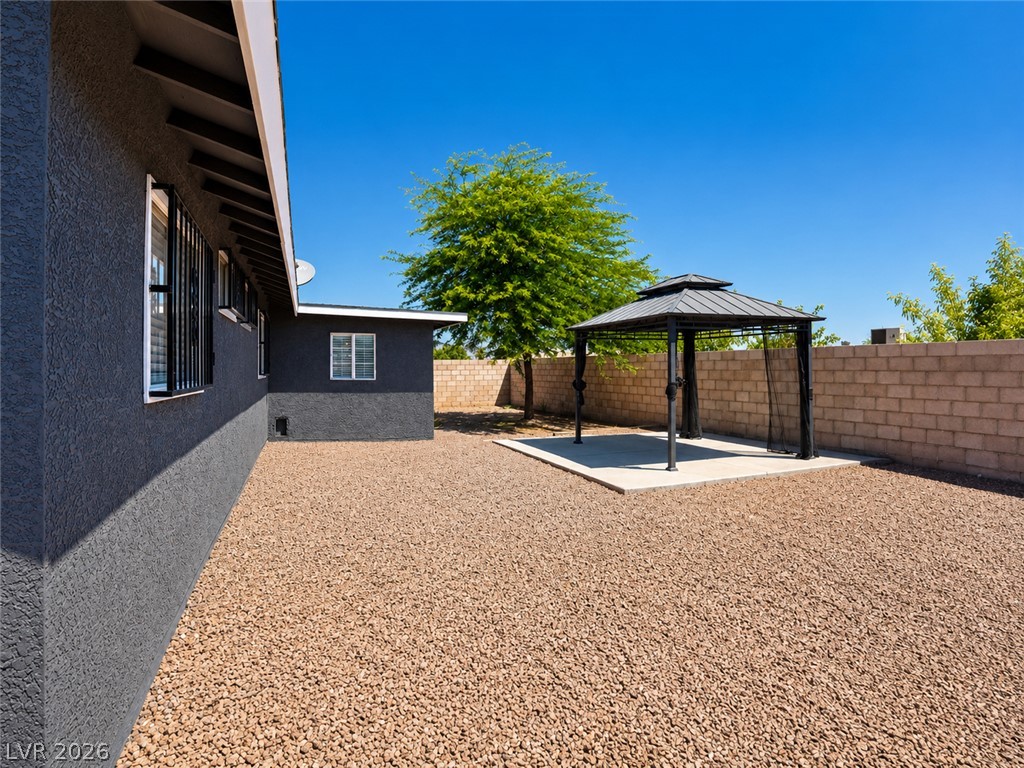 2870 South Sandhill Road Las Vegas, NV 89121 - Photo 21 of 64 A private backyard oasis with a charming gazebo provides a peaceful retreat.
