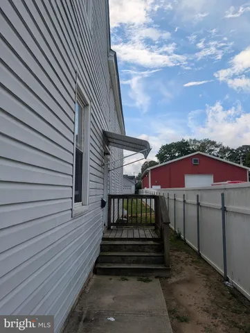 a view of a terrace with sitting area