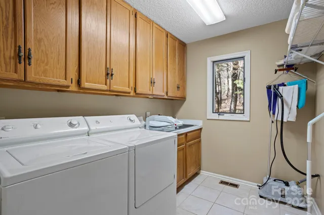 a bedroom with bed and wooden floor