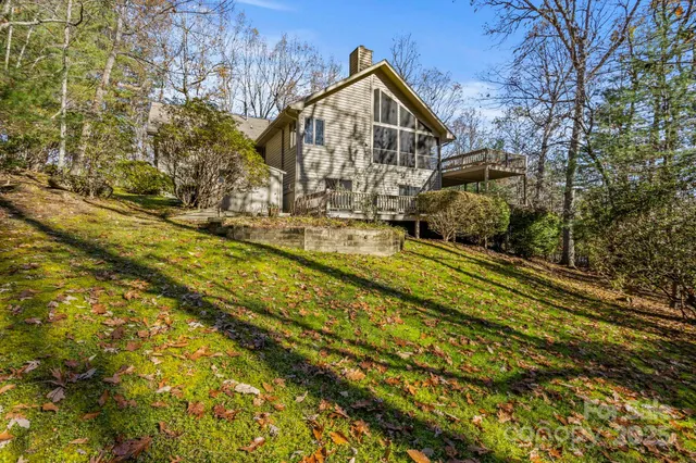 a view of a large house with a yard