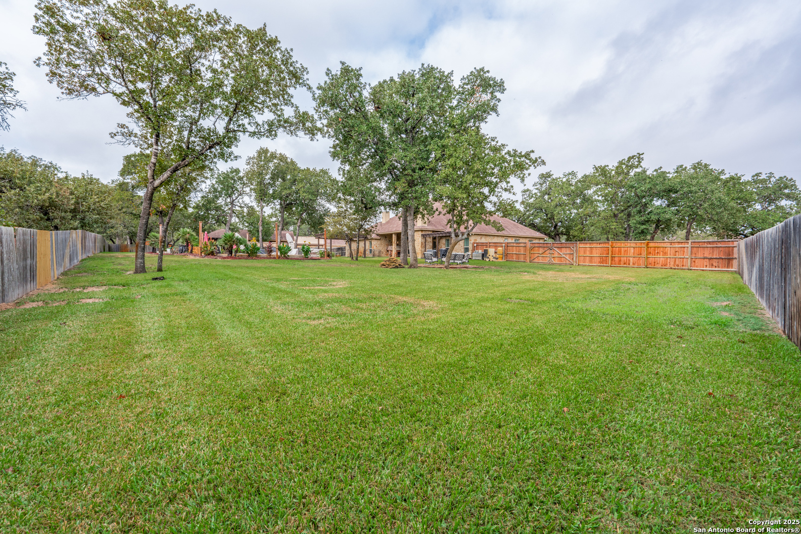 109 Bobcat Bend La Vernia, TX 78121 - Photo 36 of 36 a backyard of a house with lots of green space