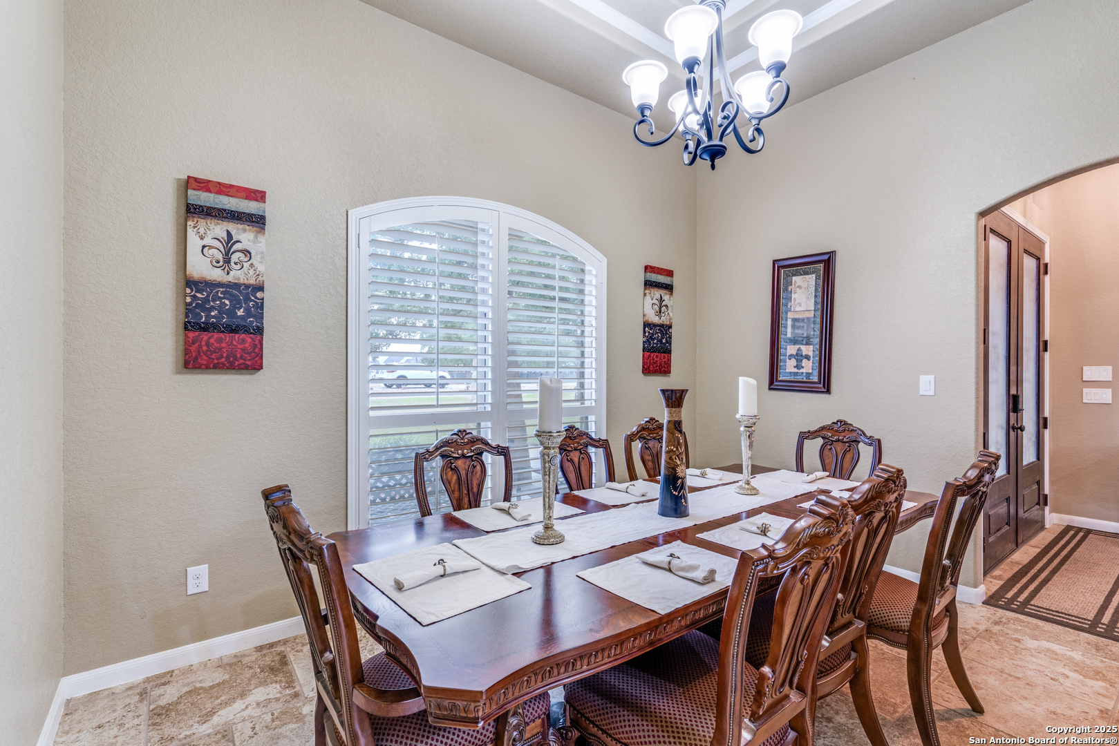 109 Bobcat Bend La Vernia, TX 78121 - Photo 10 of 36 a view of a dining room with furniture a chandelier and a window