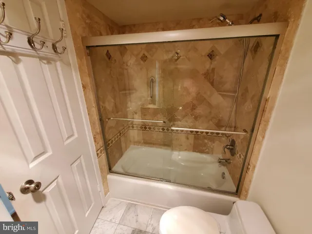 a bathroom with a bath tub