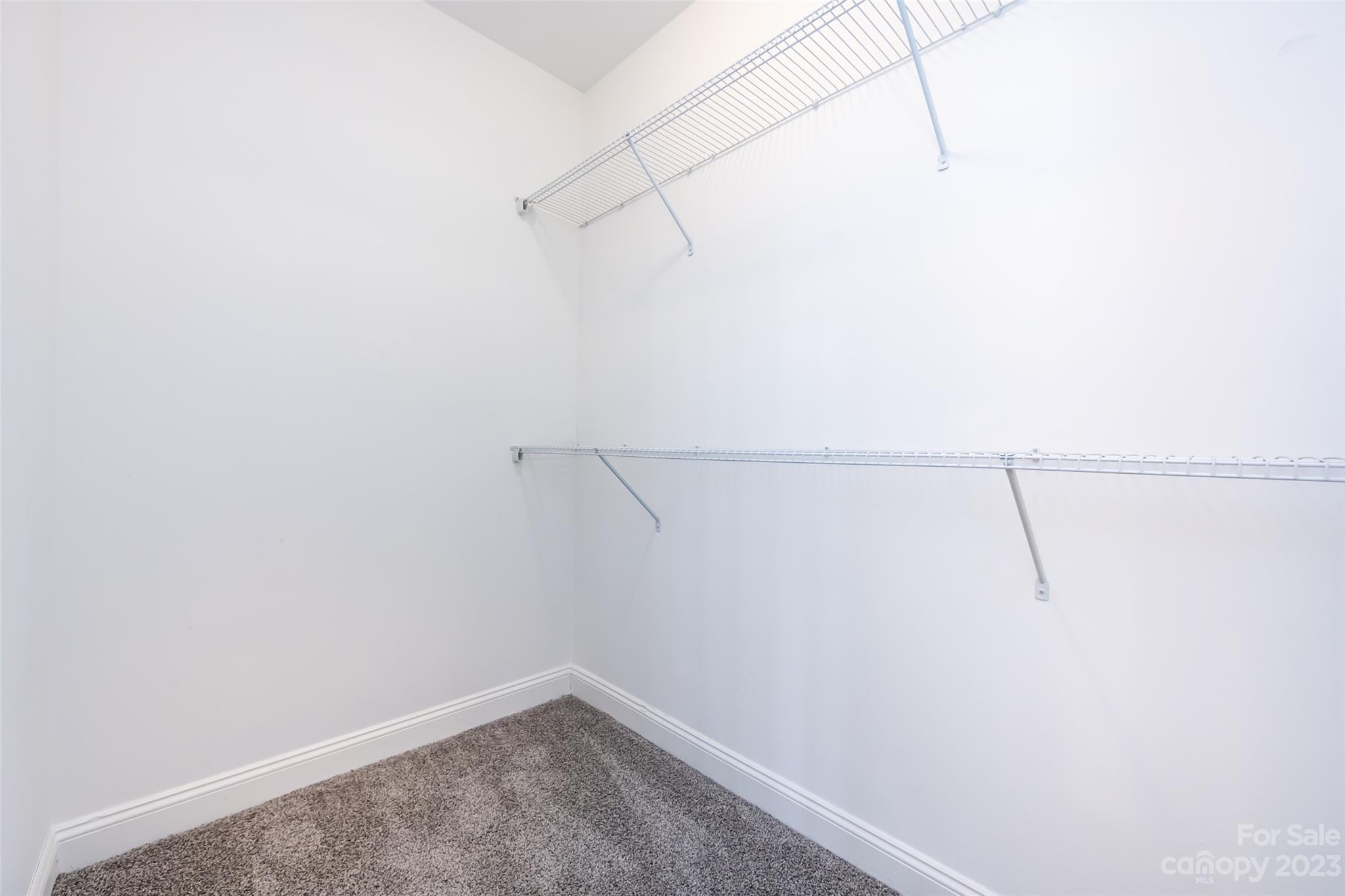 18909 Ruffner Drive Cornelius, NC 28031 - Photo 14 of 22 a view of a room with racks on the wall