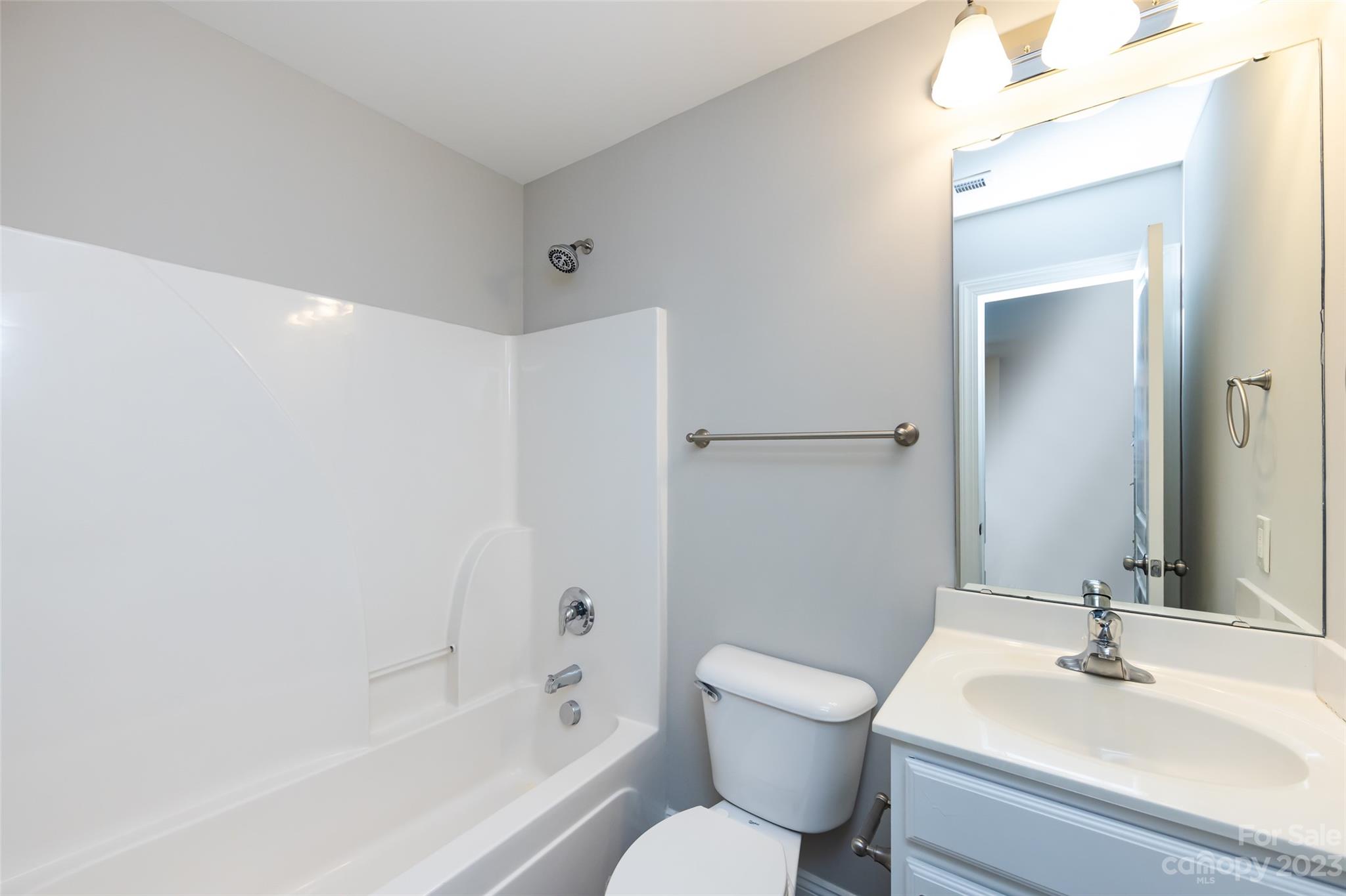 18909 Ruffner Drive Cornelius, NC 28031 - Photo 15 of 22 a bathroom with a sink toilet and shower