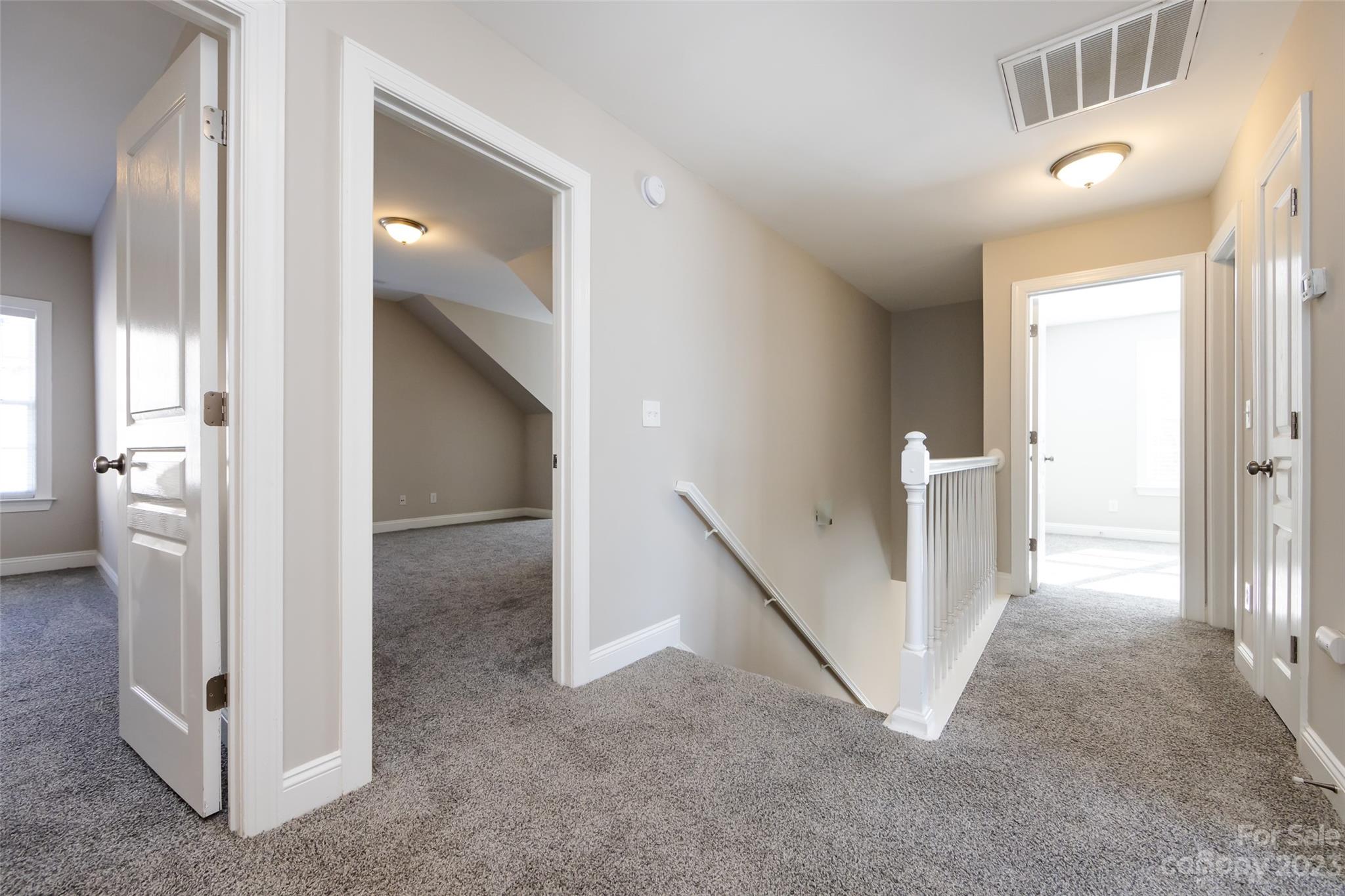 18909 Ruffner Drive Cornelius, NC 28031 - Photo 16 of 22 a view of a hallway view with staircase