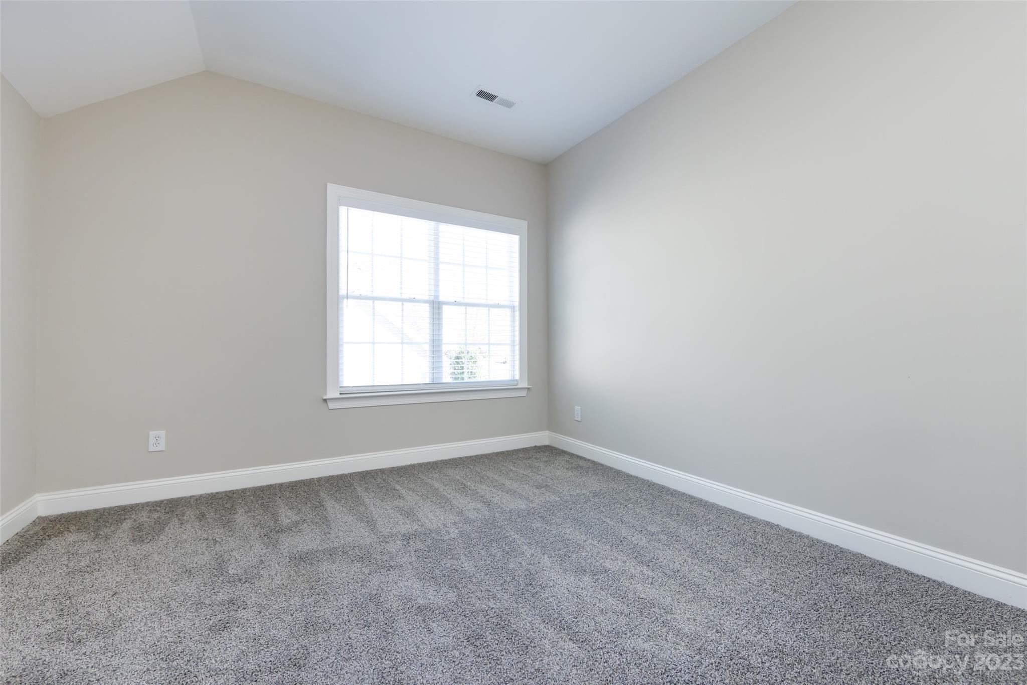 18909 Ruffner Drive Cornelius, NC 28031 - Photo 18 of 22 an empty room with a window