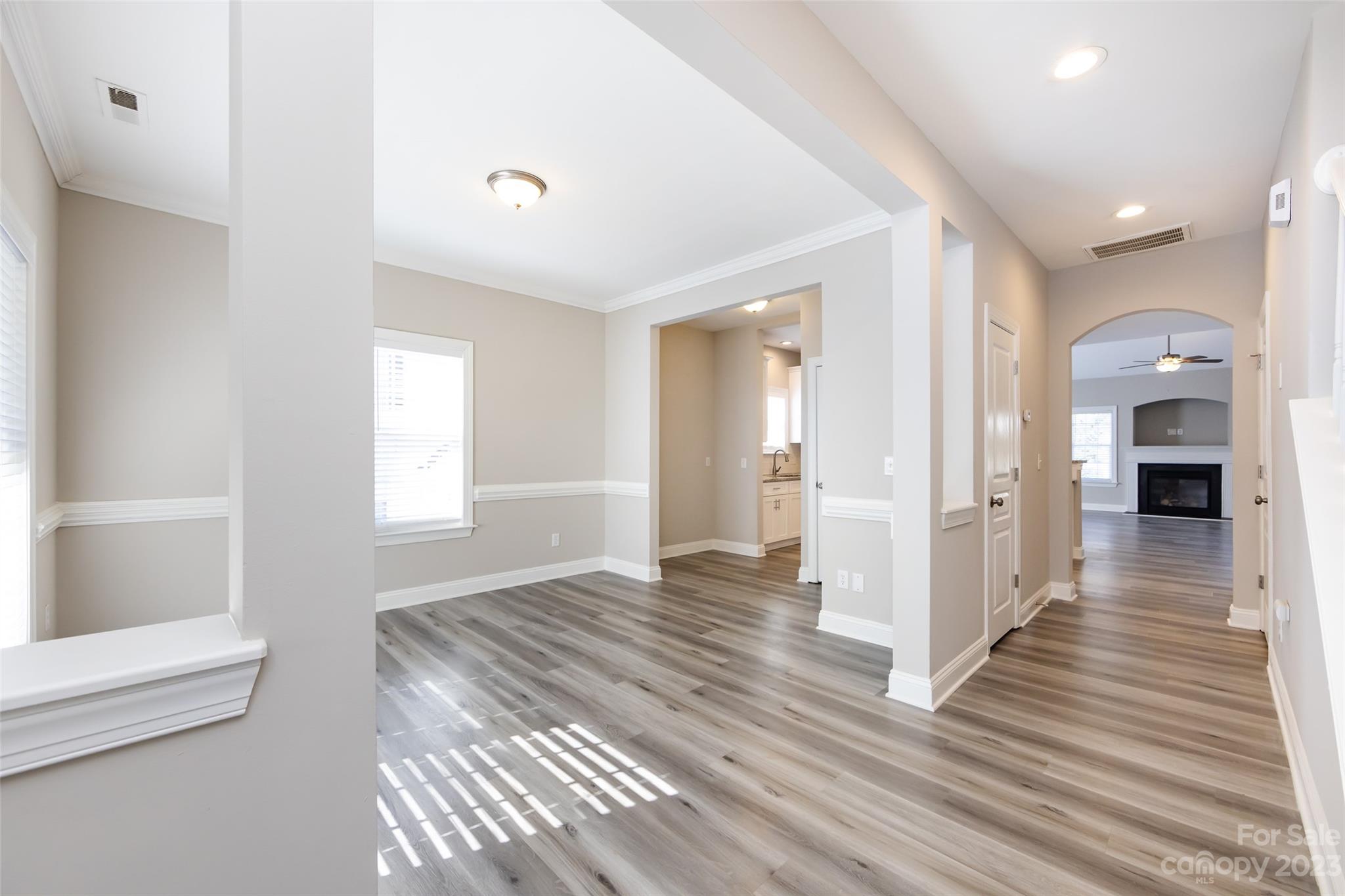 18909 Ruffner Drive Cornelius, NC 28031 - Photo 2 of 22 a view of a livingroom with wooden floor and a window