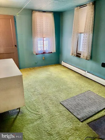 a view of a room with entryway