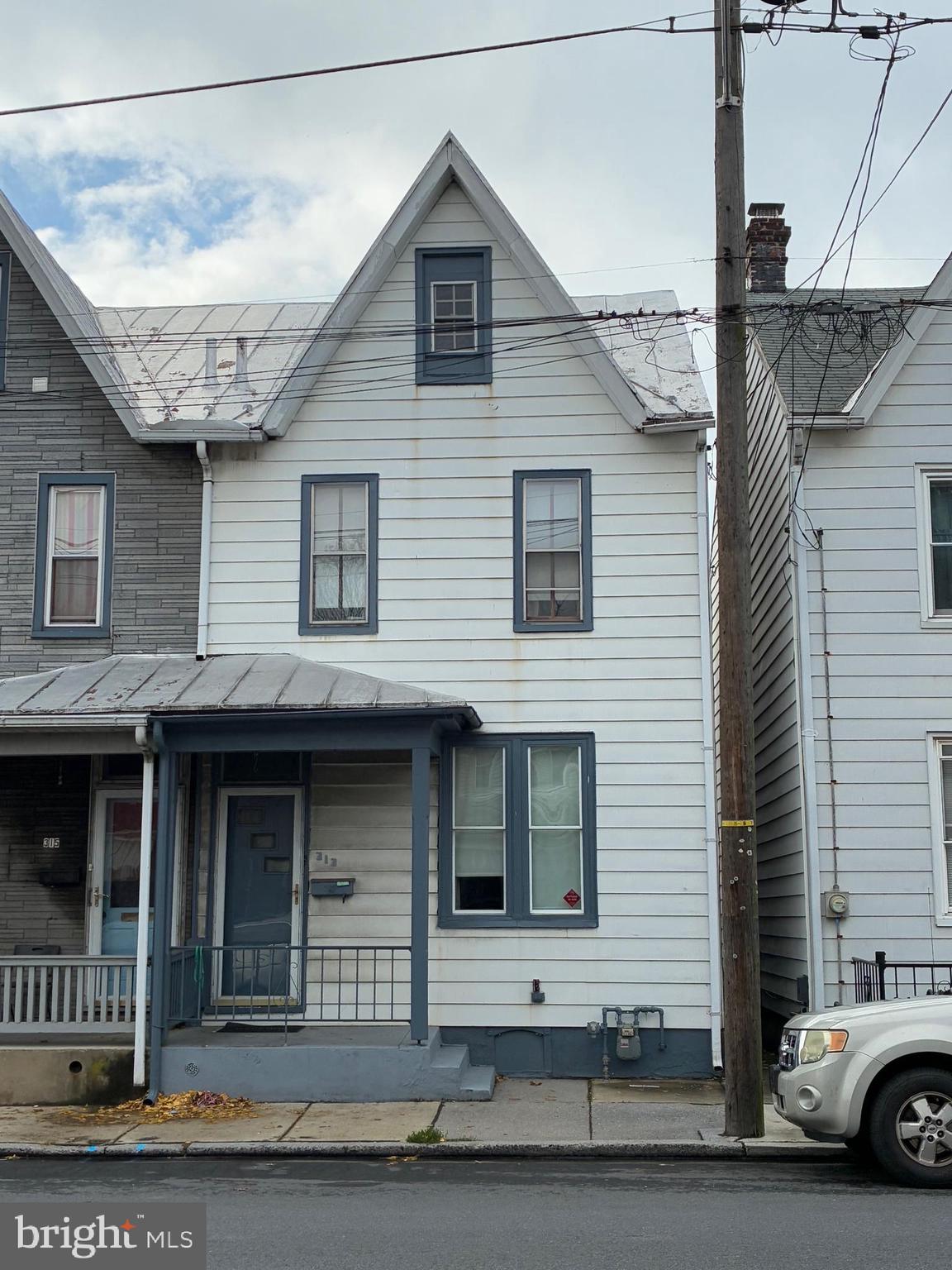 313 South 10th Street Lebanon, PA 17042 - Photo 28 of 29 a front view of a house with a porch