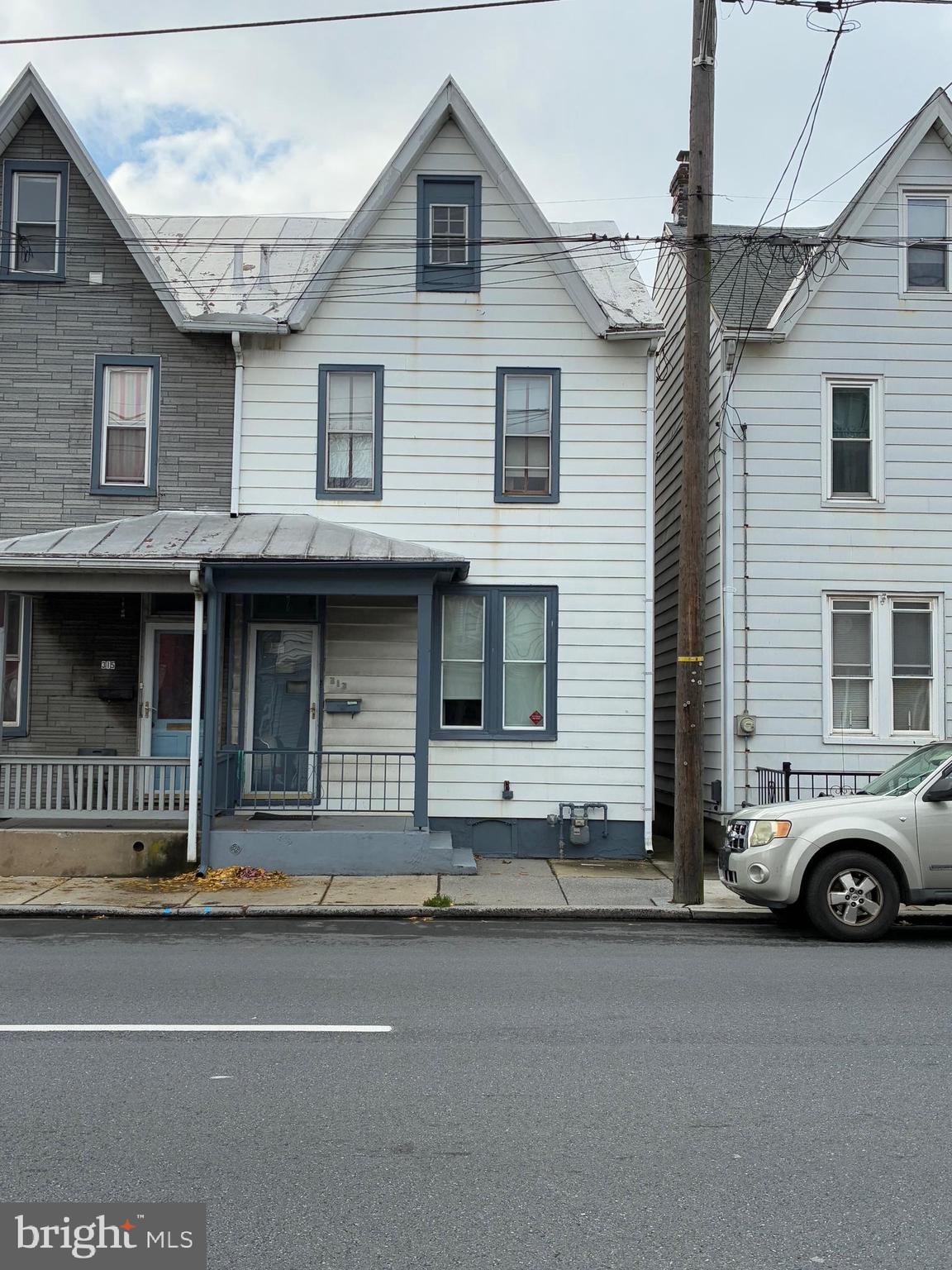 313 South 10th Street Lebanon, PA 17042 - Photo 29 of 29 a front view of a house with a parking space