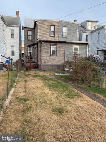 a view of a garden from a balcony