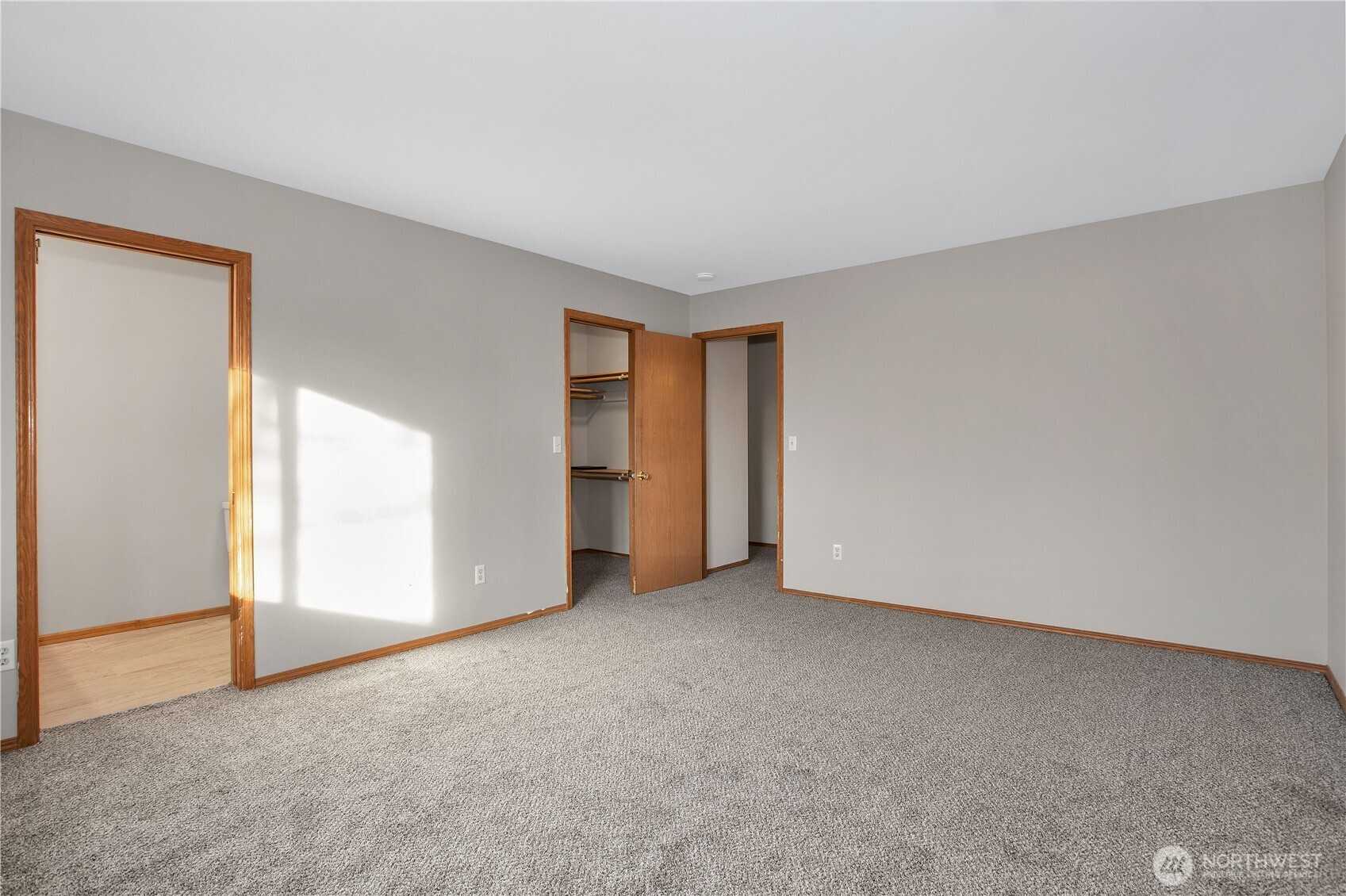 5607 Vincent Court Southeast Lacey, WA 98513 - Photo 13 of 40 an empty room with a natural light