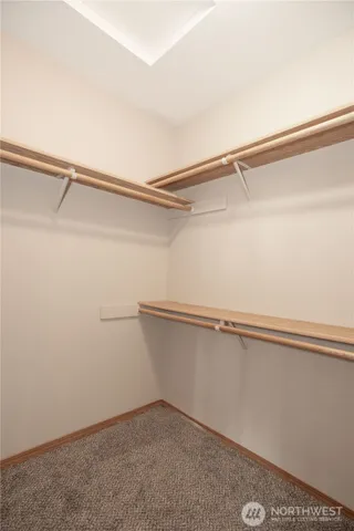 a view of a room with racks on the wall