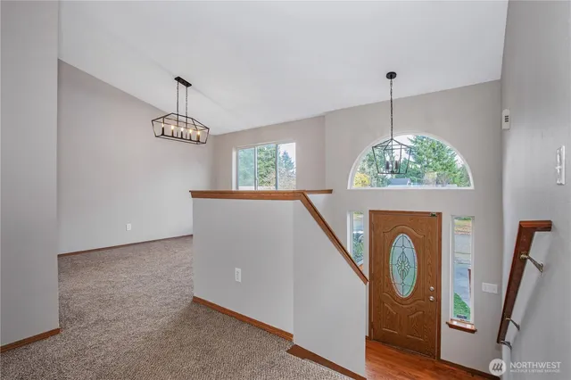 a view of livingroom with furniture and chandelier
