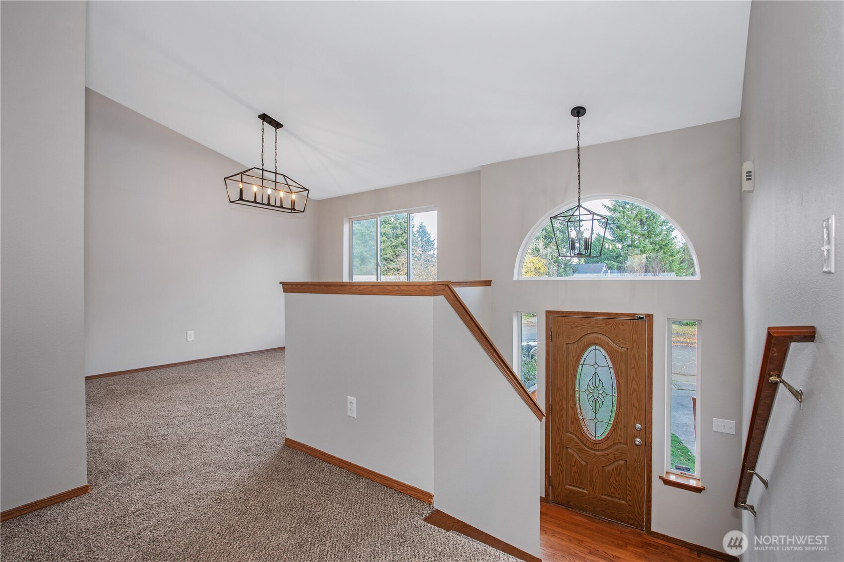 5607 Vincent Court Southeast Lacey, WA 98513 - Photo 3 of 40 a view of livingroom with furniture and chandelier