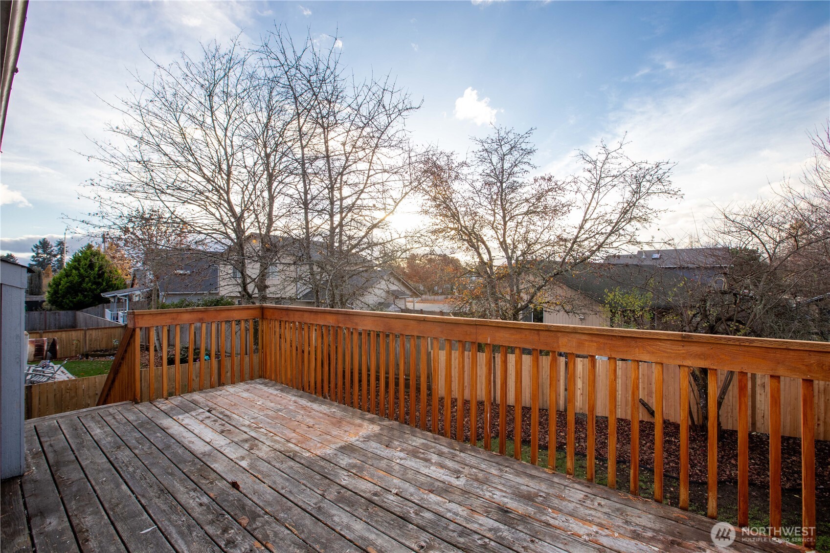 5607 Vincent Court Southeast Lacey, WA 98513 - Photo 34 of 40 a view of deck with wooden floor and outdoor seating