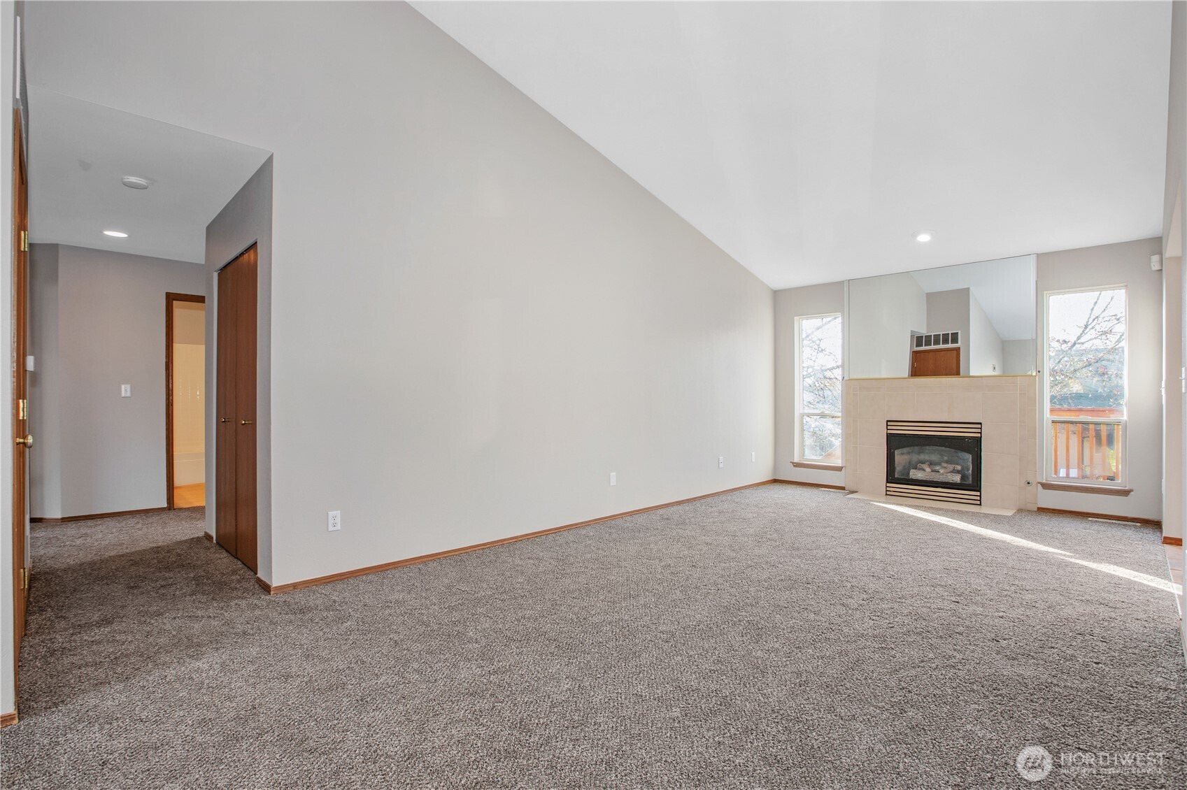 5607 Vincent Court Southeast Lacey, WA 98513 - Photo 5 of 40 a view of a livingroom with a fireplace and a window