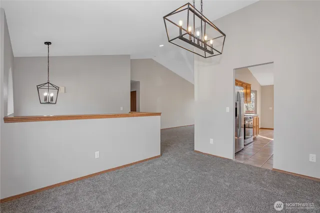 a view of a hallway with staircase