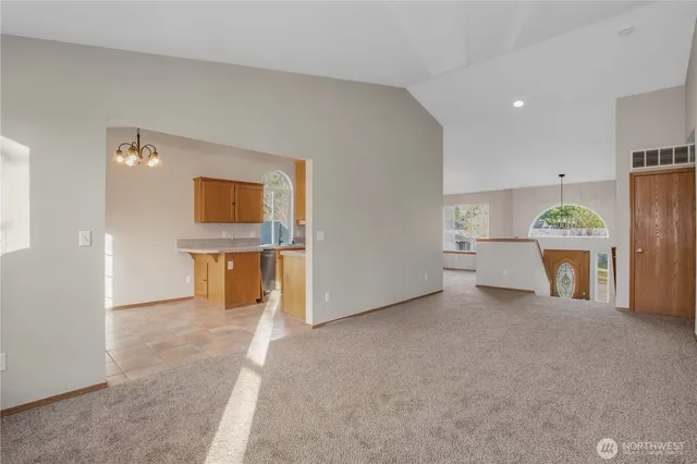 a view of a kitchen with a sink