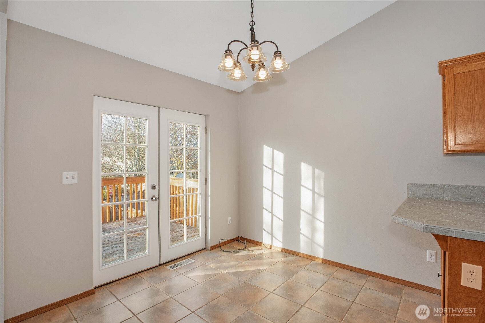 5607 Vincent Court Southeast Lacey, WA 98513 - Photo 9 of 40 a view of an empty room with a window