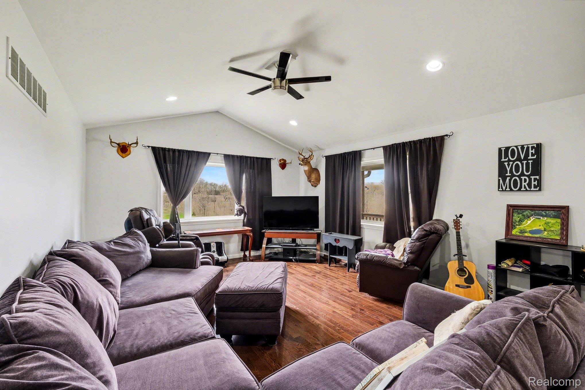 2800 Meadowdale Road Metamora, MI 48455 - Photo 7 of 28 Living area featuring wood finished floors and ceiling fan