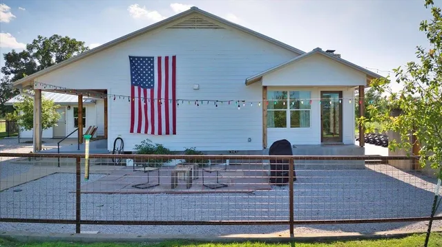a front view of house with yard