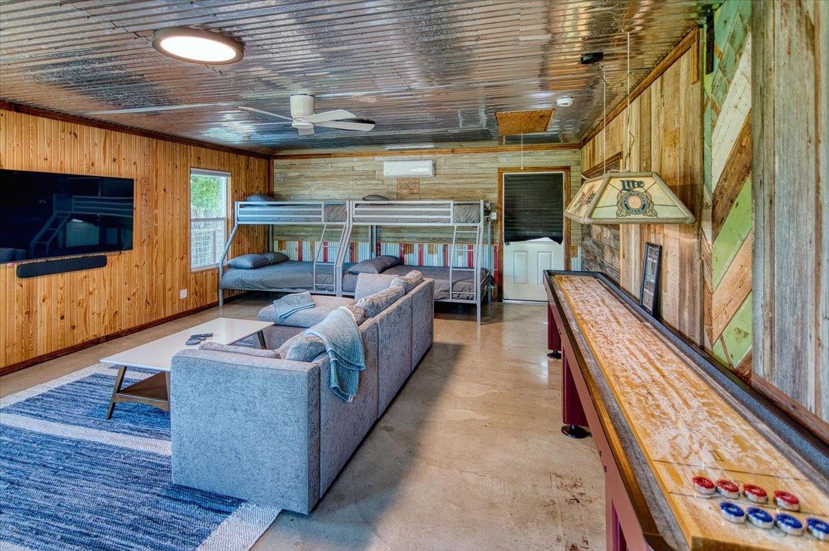 19811 Ranch Road 152 Llano, TX 78643 - Photo 29 of 30 a living room with furniture fireplace and flat screen tv