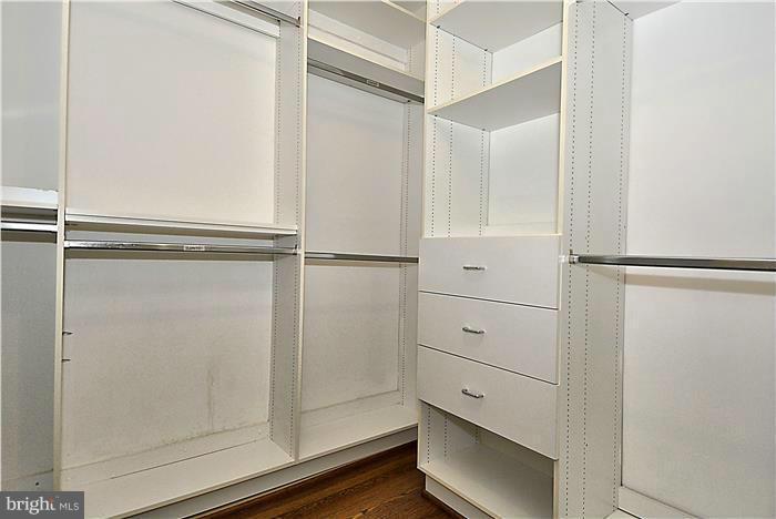 1291 Berry Place McLean, VA 22102 - Photo 17 of 30 a view of an empty walk in closet