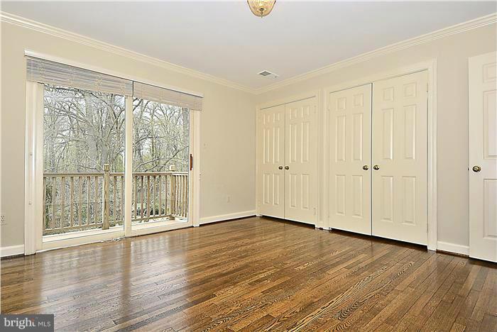 1291 Berry Place McLean, VA 22102 - Photo 19 of 30 an empty room with wooden floor and windows