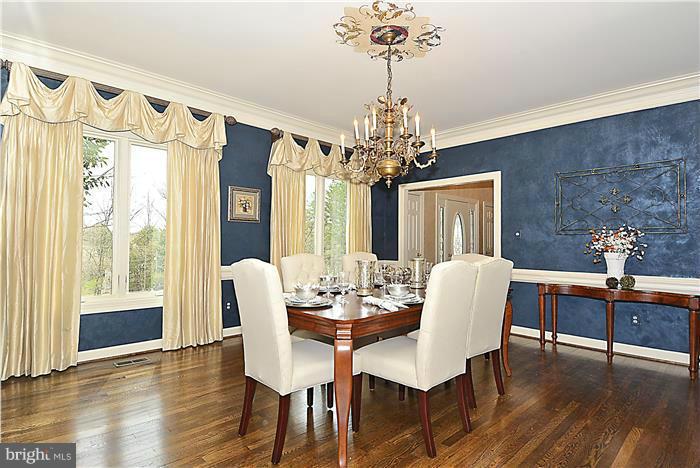 1291 Berry Place McLean, VA 22102 - Photo 8 of 30 a view of a dining room with furniture window and wooden floor