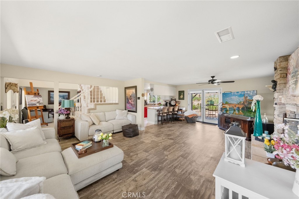 3162 Reche Road Fallbrook, CA 92028 - Photo 5 of 33 a living room with furniture and a wooden floor