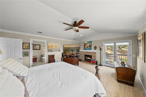a kitchen with kitchen island granite countertop a sink counter and chairs