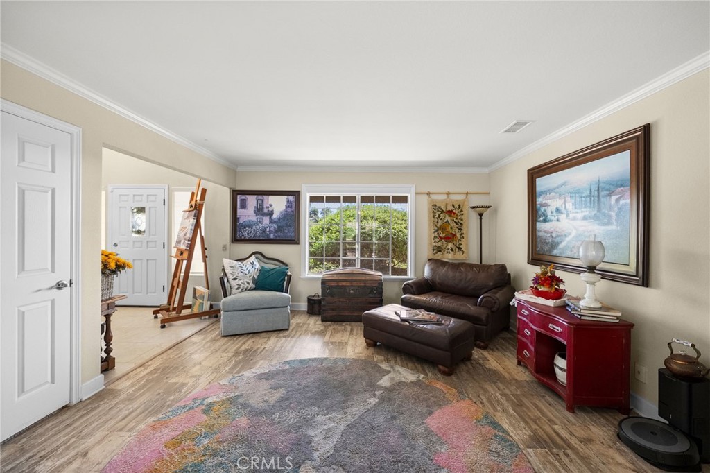 3162 Reche Road Fallbrook, CA 92028 - Photo 10 of 33 a living room with furniture and a window