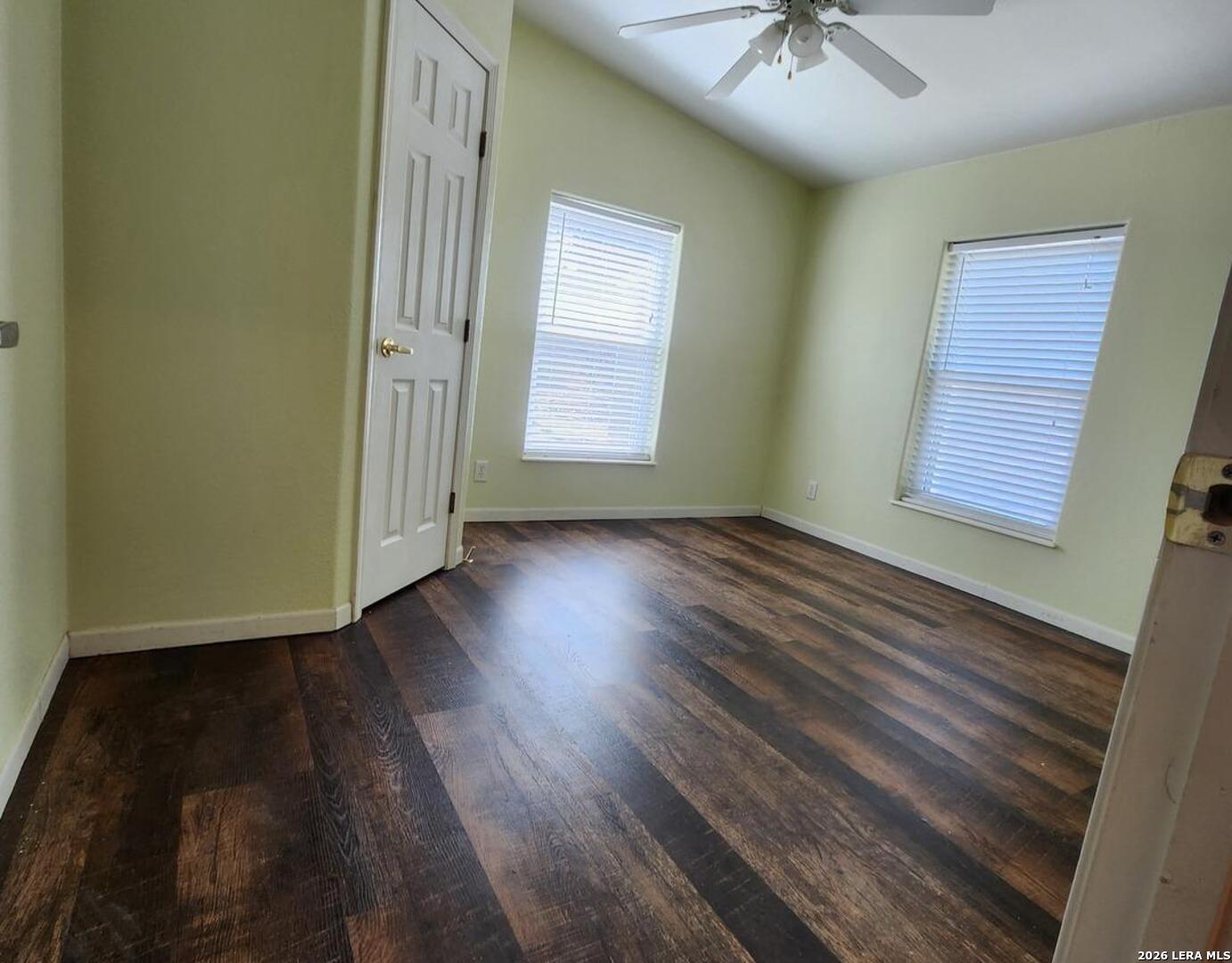 140 River Ranch Road Boerne, TX 78006 - Photo 23 of 30 a view of an empty room with wooden floor and a window