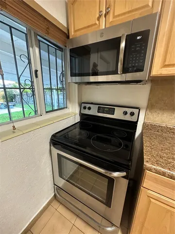 a view of a garden and basketball court