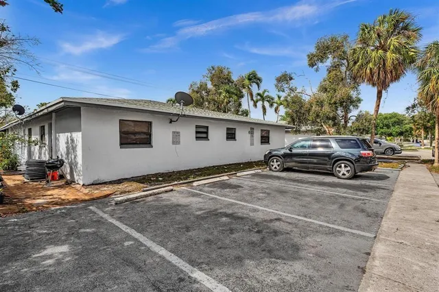 a view of a car parked on the side of the road