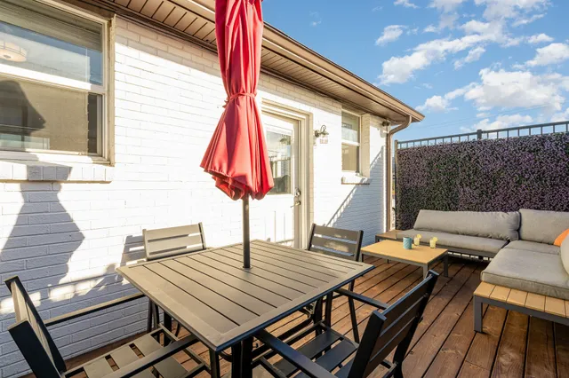 a view of a outdoor seating area with furniture
