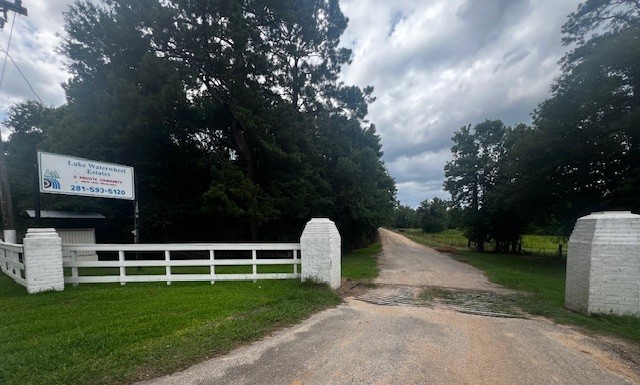 Tbd Tbd Francies Shepherd, TX 77371 - Photo 11 of 11 a front view of a house with garden