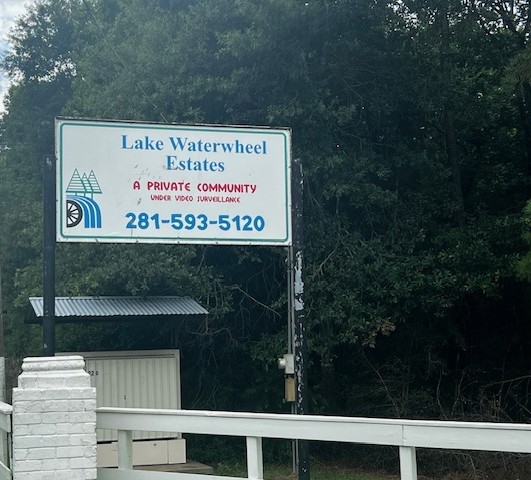 Tbd Tbd Francies Shepherd, TX 77371 - Photo 10 of 11 a sign on the side of a building