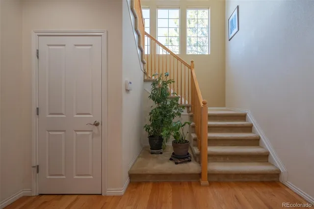 a view of entryway with wooden floor