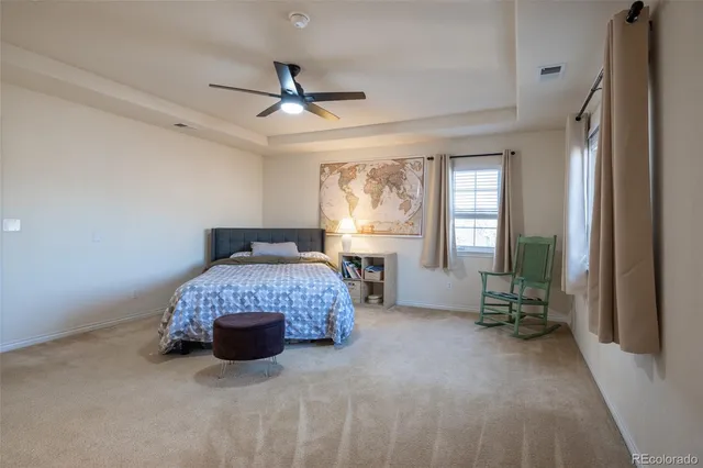 a living room with a fireplace and a window