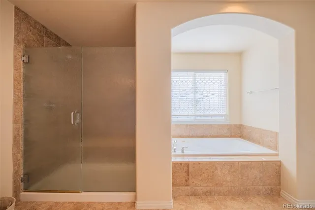 a bathroom with a sink and cabinets