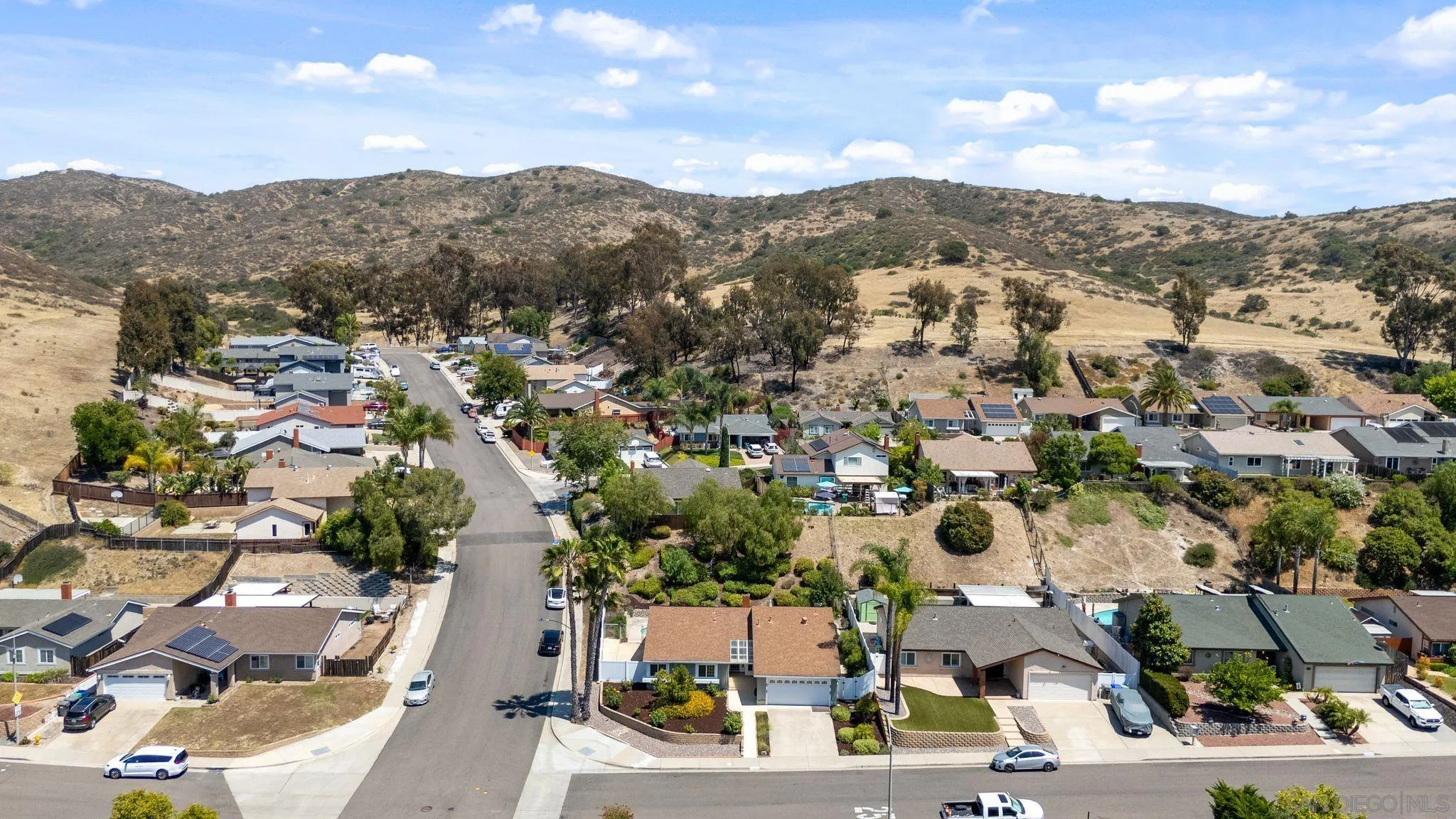 10565 Strathmore Drive Santee, CA 92071 - Photo 56 of 59 an aerial view of residential houses with outdoor space