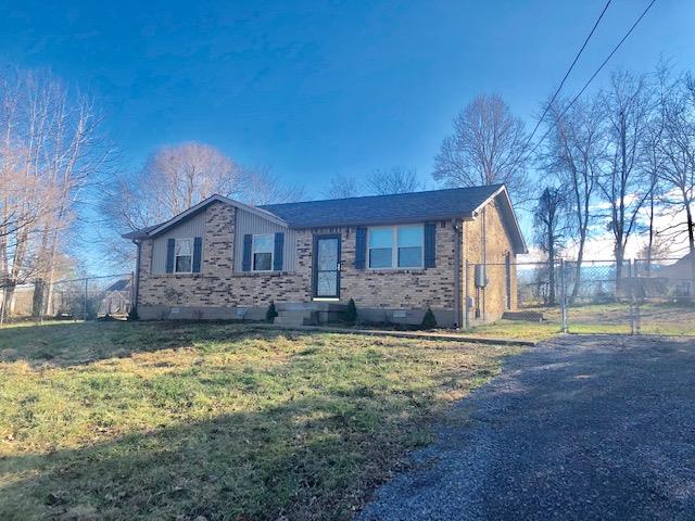 7820 Chester Road Fairview, TN 37062 - Photo 2 of 22 a house with a big yard and large trees
