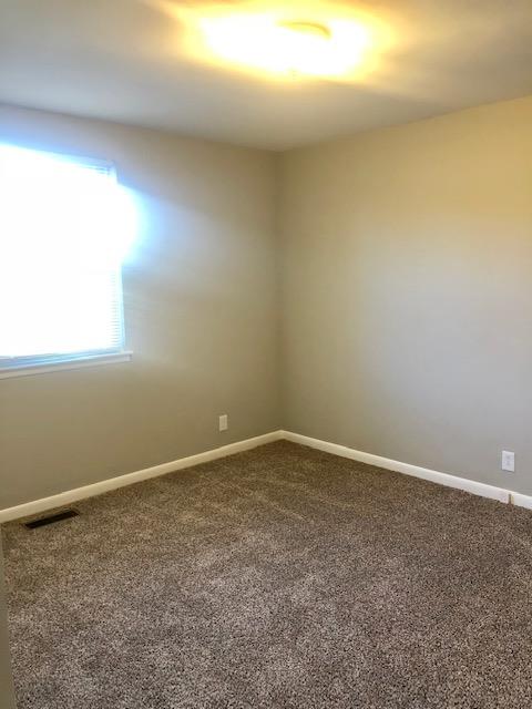 7820 Chester Road Fairview, TN 37062 - Photo 18 of 22 an empty room with a empty space and a window