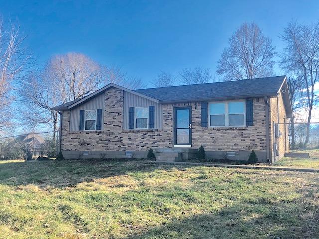 7820 Chester Road Fairview, TN 37062 - Photo 3 of 22 a front view of a house with a yard
